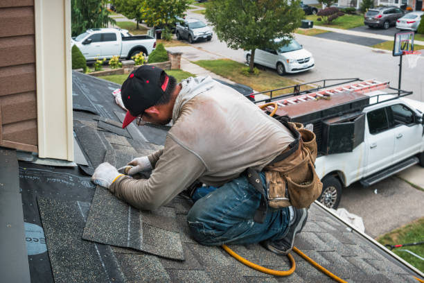 Professional Roofing technician working in High Hill, MO